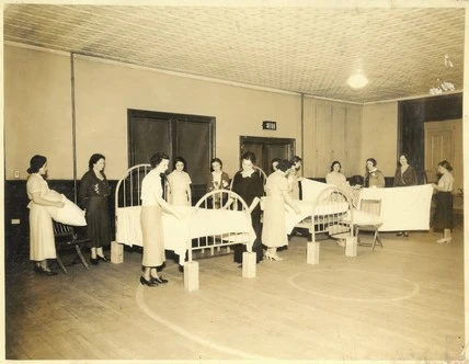 The Orchard House contained a Library, a Hall for sports, pre-Kindergarten, and citizenship classes. On weekends, the Orchard House hosted “football weddings” which invited all family members including children. Guests were served beer, wine, and sandwiches. While not fancy, they were great celebrations. 

Additionally, the Orchard House put on plays and offered classes such as teaching women how to correctly make hospital beds.